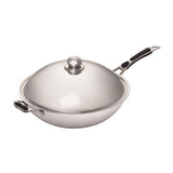 Elegant Borrelli induction wok pan with stainless steel finish and ergonomic handle, complete with tempered glass lid, ideal for stir-frying and sautéing on modern induction cooktops.